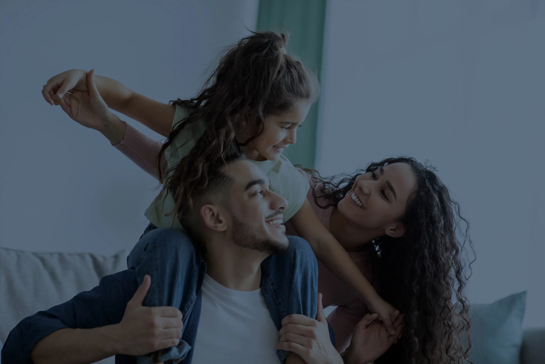 smiling parents with daughter